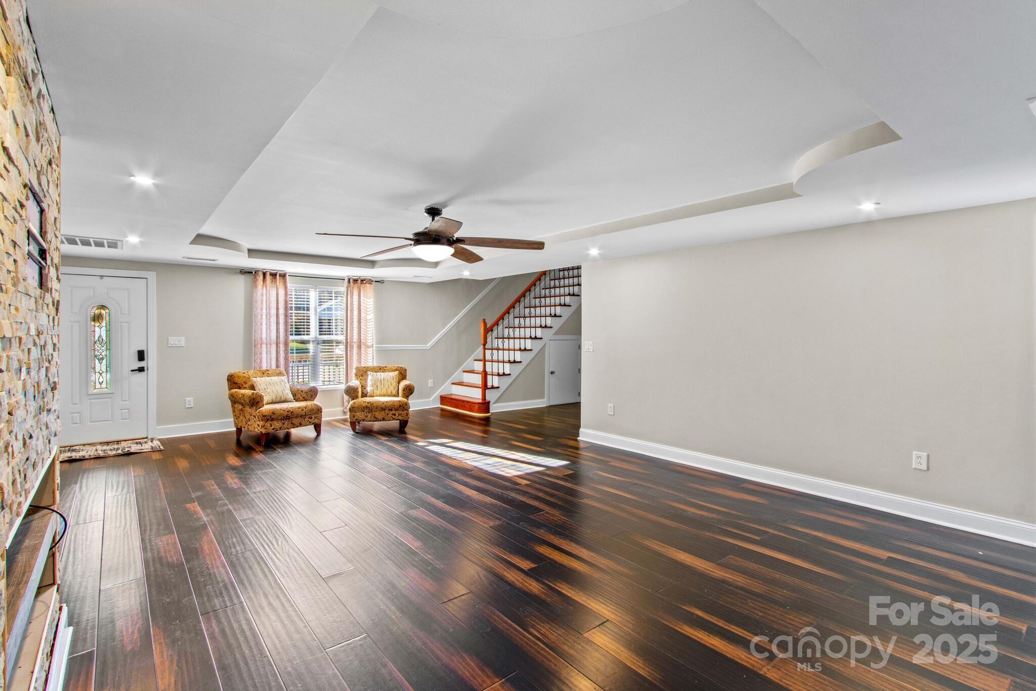 1493 Swicegood Road Linwood, NC 27299 - Photo 9 of 45 a view of livingroom with furniture and wooden floor