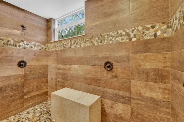 a view of a swimming pool with a yard