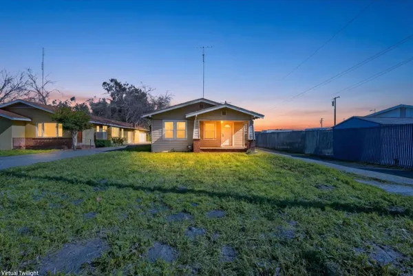 a view of a house with a big yard