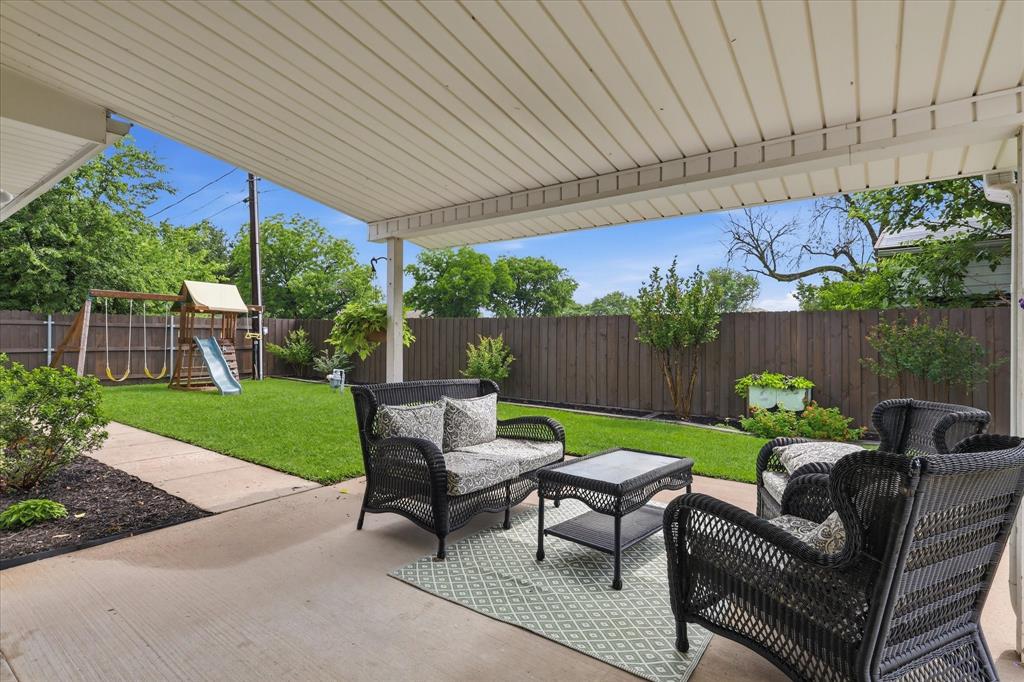 202 Colonial Heights Sanger, TX 76266 - Photo 26 of 27 a view of a patio with furniture and garden
