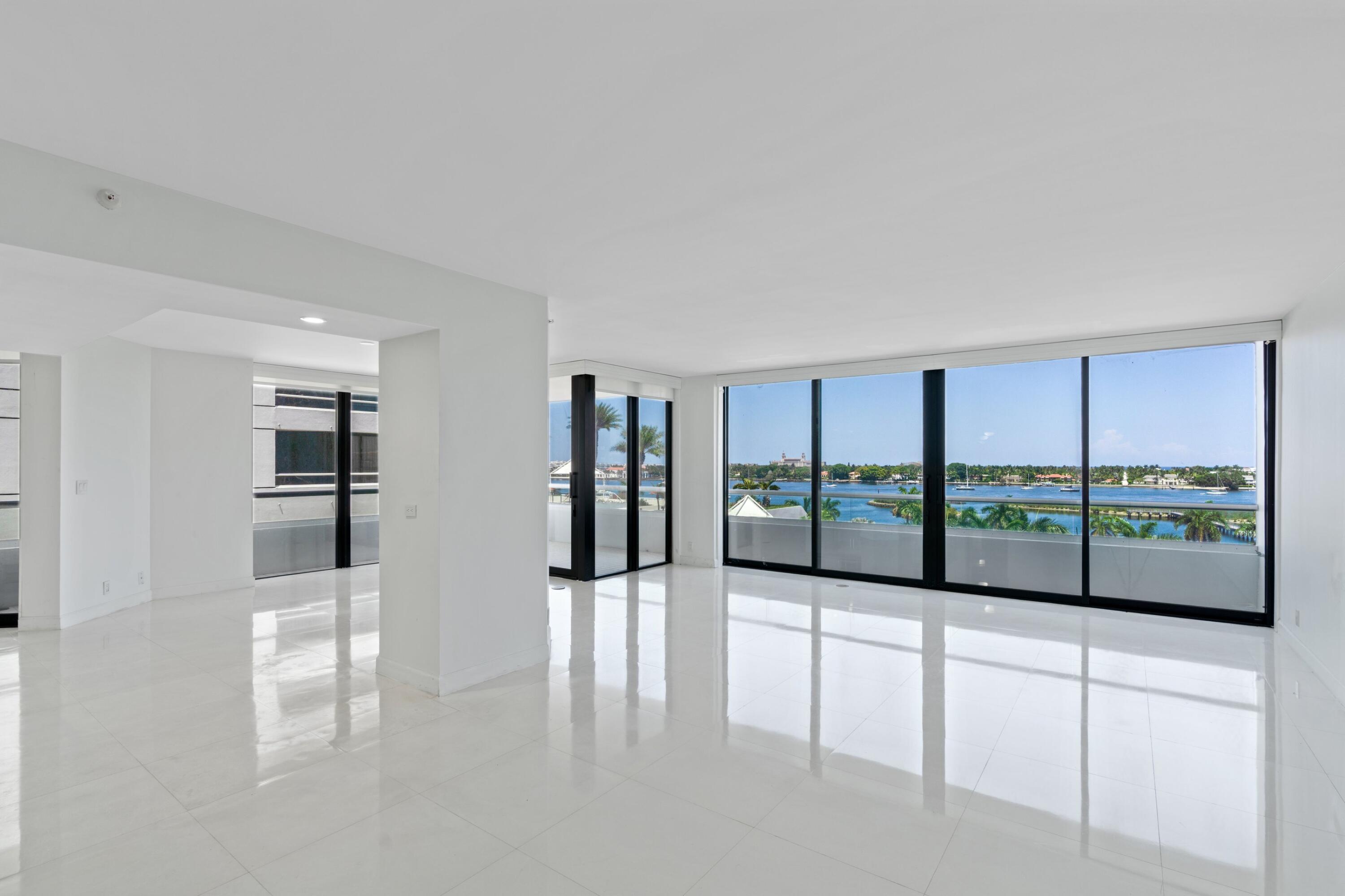 529 South Flagler Drive, Unit 6E West Palm Beach, FL 33401 - Photo 3 of 24 a view of a living room hardwood floor and a large window