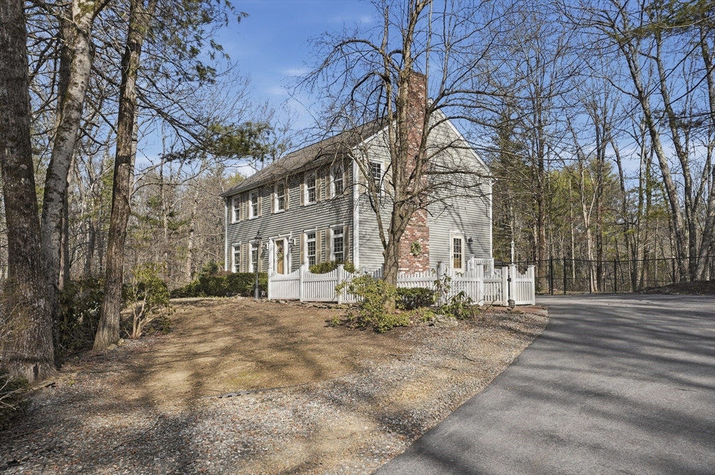 4 Charnock Circle Rutland, MA 01543 - Photo 1 of 42 a street view with residential house