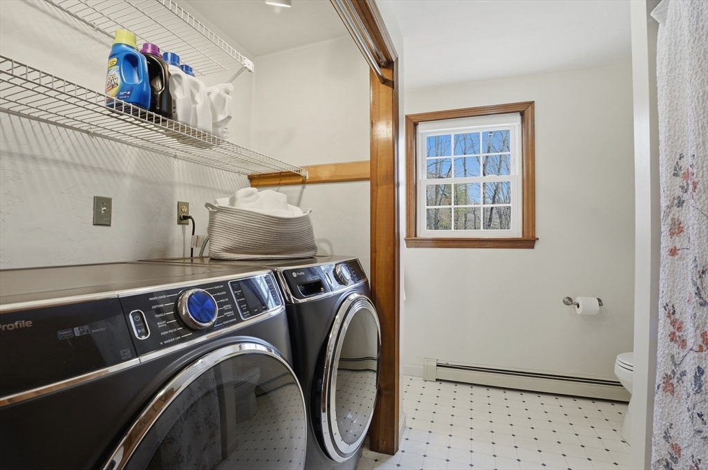 4 Charnock Circle Rutland, MA 01543 - Photo 27 of 42 a utility room with dryer and washer