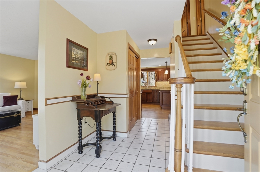 4 Charnock Circle Rutland, MA 01543 - Photo 4 of 42 a view of a hallway with seating area