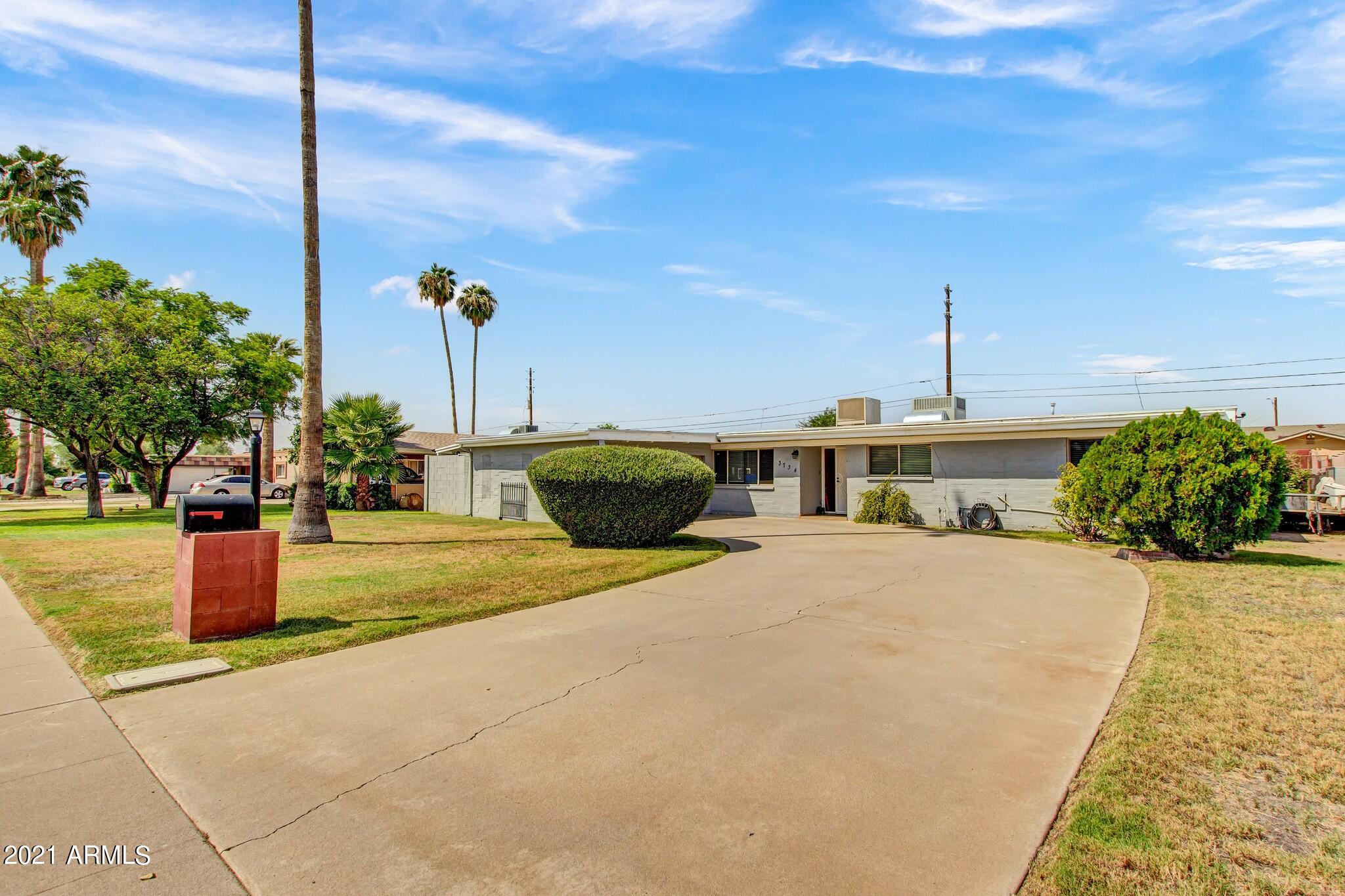 3734 West Griswold Road Phoenix, AZ 85051 - Photo 1 of 23 03-Griswold