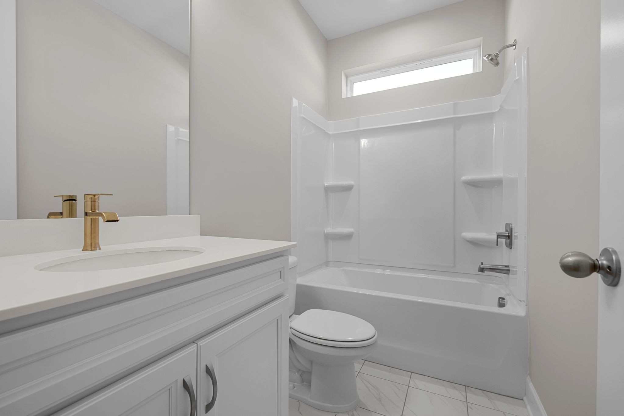 2001 Tee Time Trace Mount Juliet, TN 37122 - Photo 24 of 34 a bathroom with a sink a toilet and shower