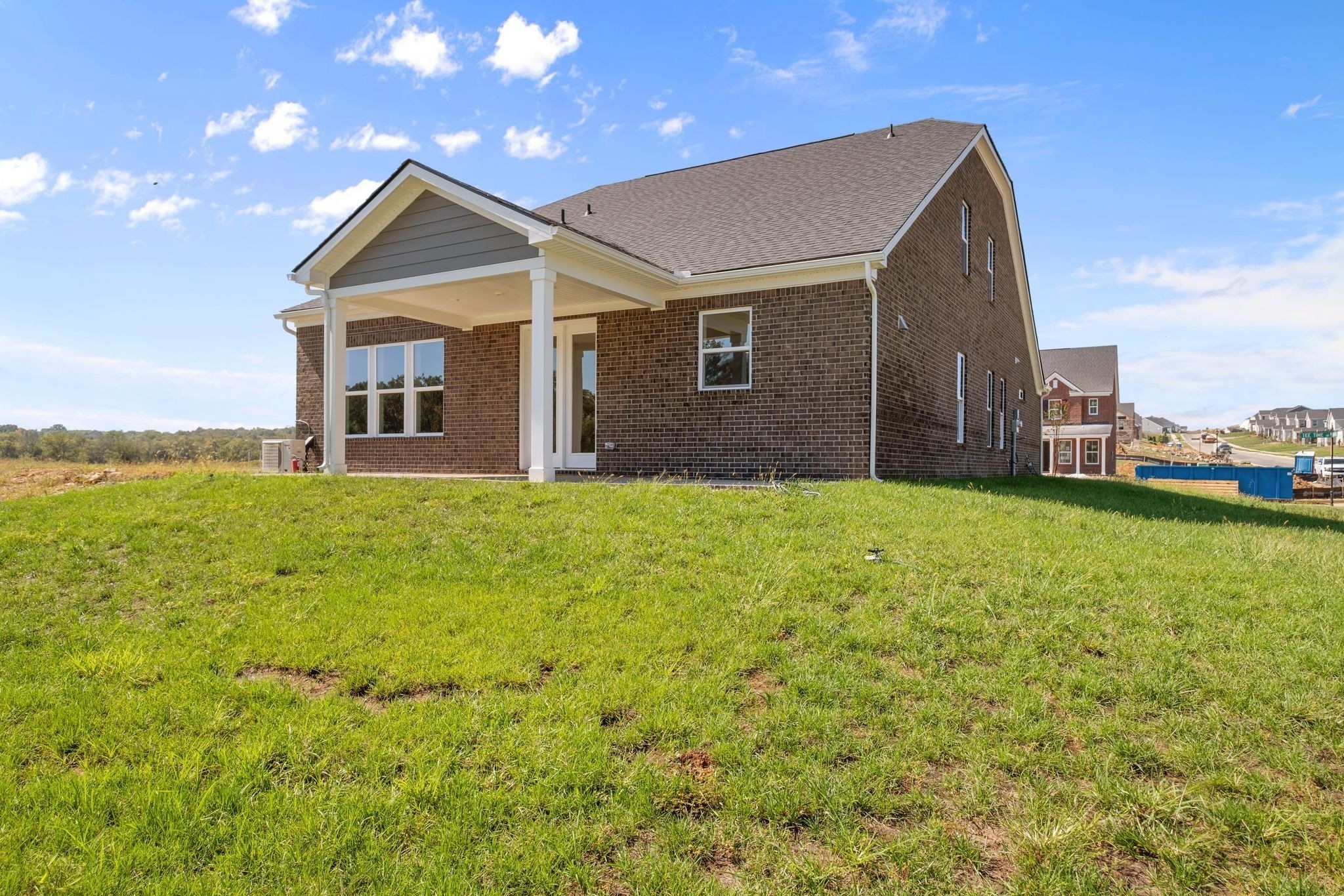 2001 Tee Time Trace Mount Juliet, TN 37122 - Photo 33 of 34 a view of a house with a yard