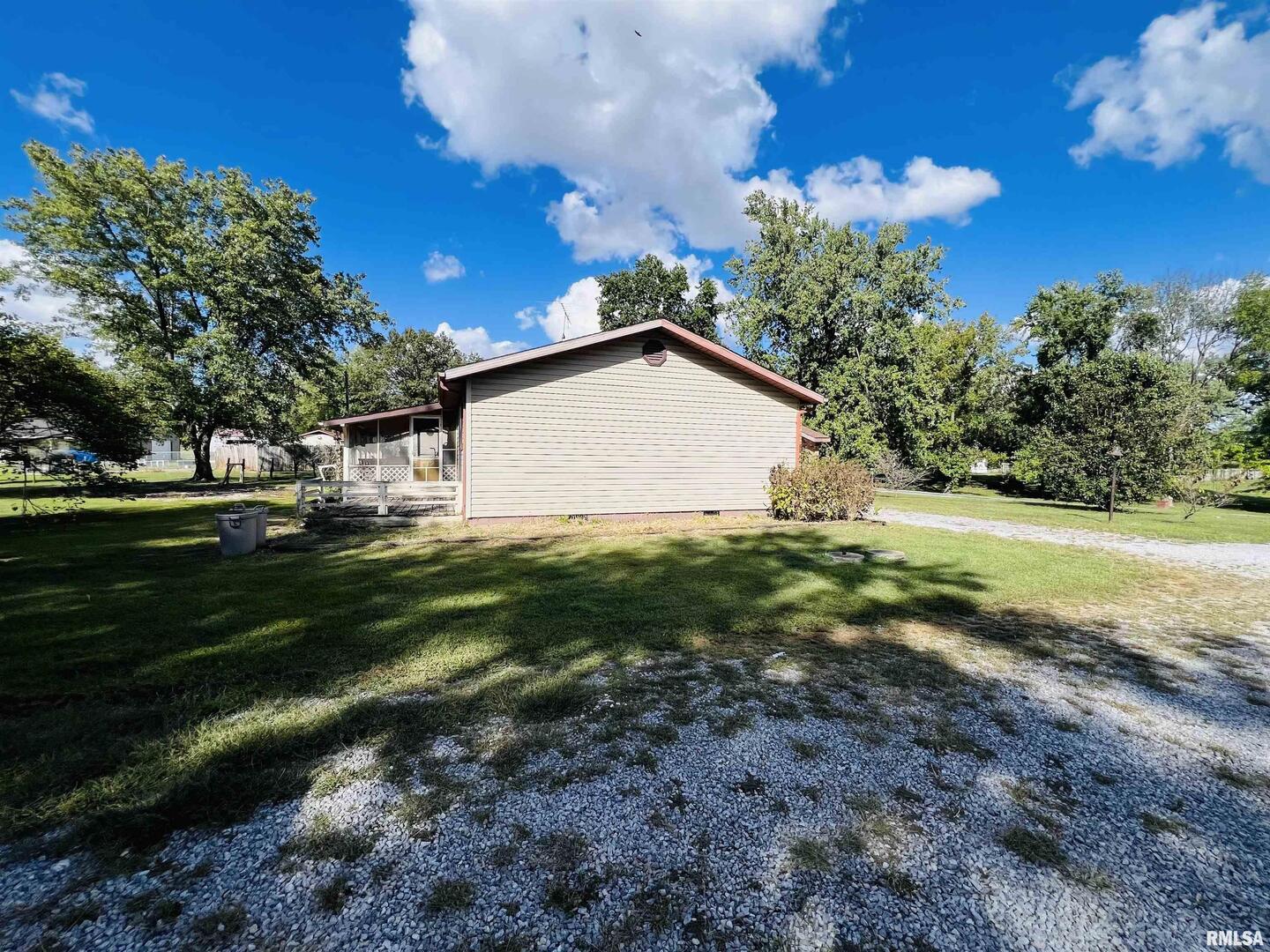 295 Country Acres Road Eldorado, IL 62930 - Photo 9 of 32 a view of a house with a yard