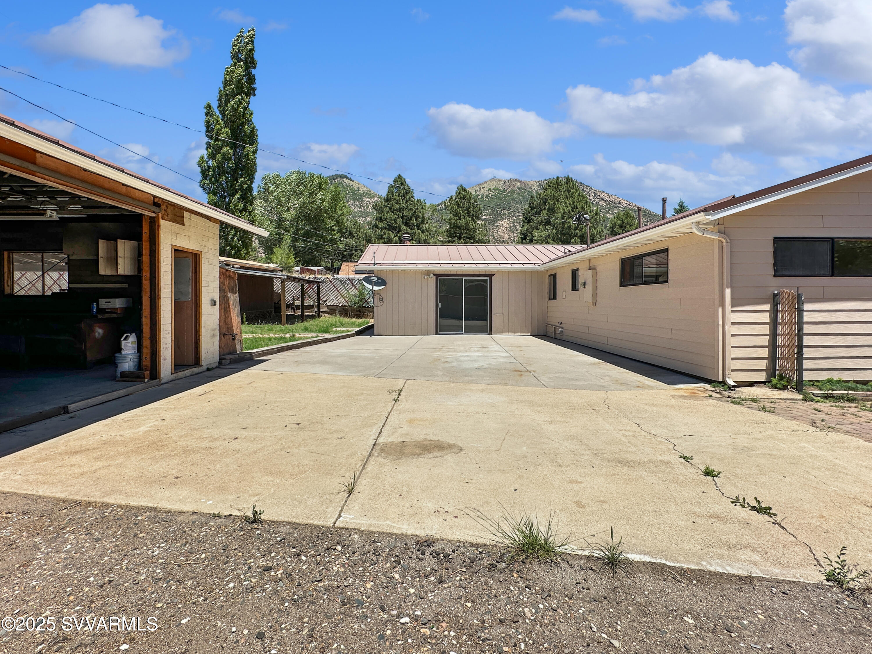 3219 North Manor Road Flagstaff, AZ 86004 - Photo 17 of 23 a view of a house with a backyard