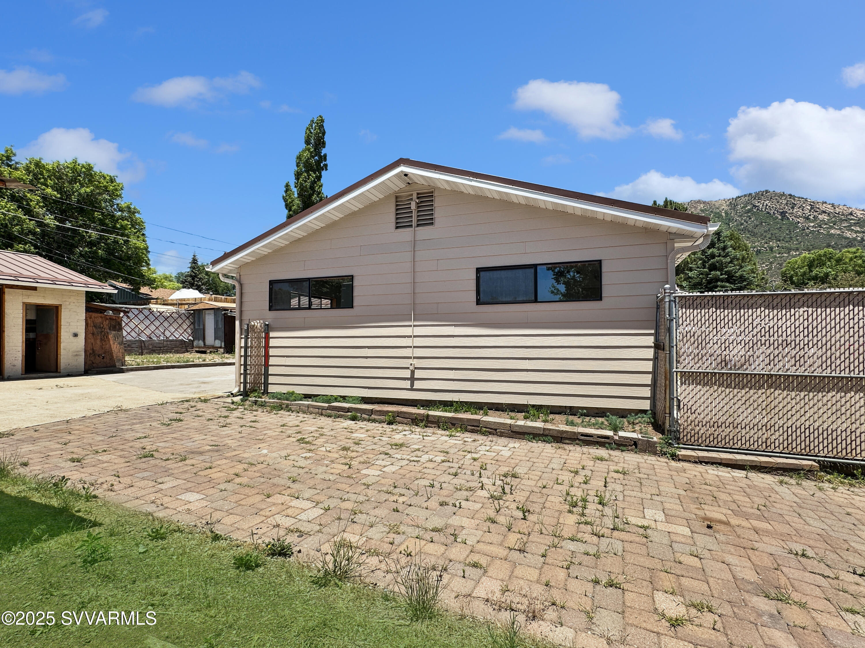 3219 North Manor Road Flagstaff, AZ 86004 - Photo 21 of 23 a view of a house with a yard