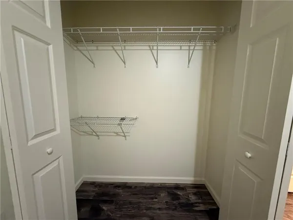 a view of a room with racks on the wall