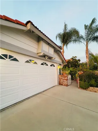 a view of a house with a garage