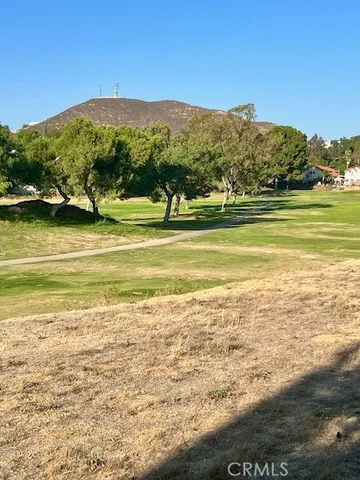 a view of an ocean and a mountain