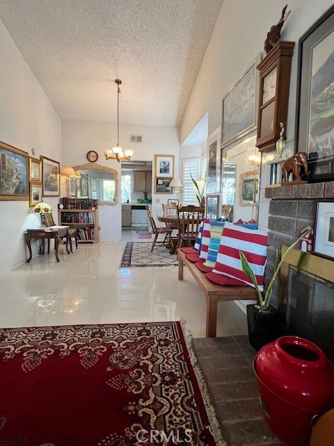 1455 Cresta Road Corona, CA 92879 - Photo 9 of 31 The living room flows effortlessly into the dining area next to the kitchen.