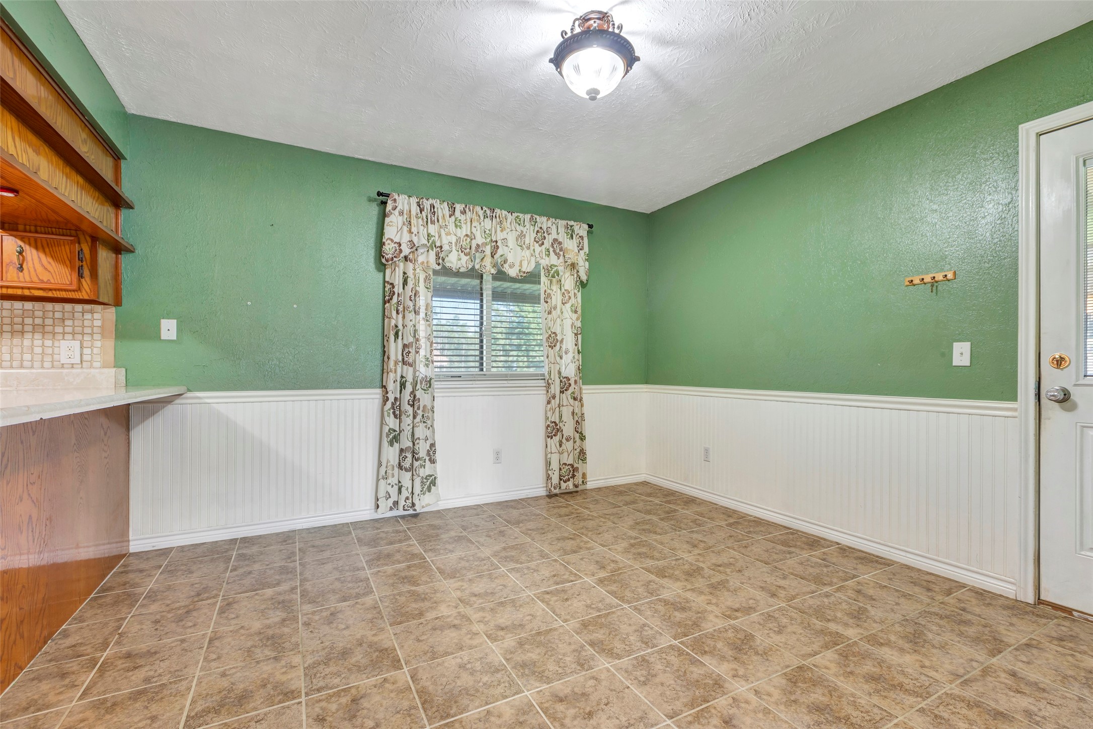 302 Walnut Cove Road Onalaska, TX 77360 - Photo 2 of 25 a view of a room with a large window