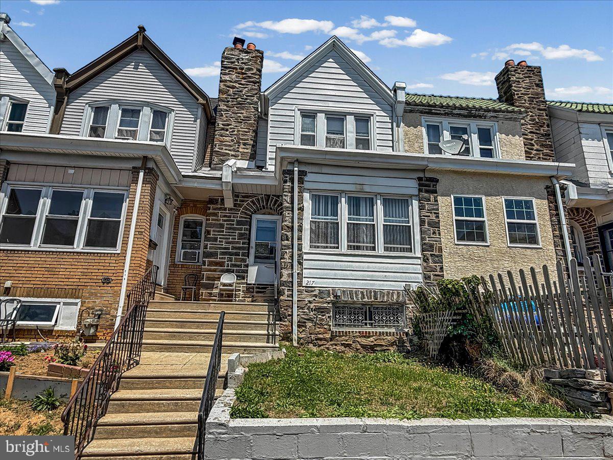 217 Avon Road Upper Darby, PA 19082 - Photo 1 of 16 a view of a house with a yard