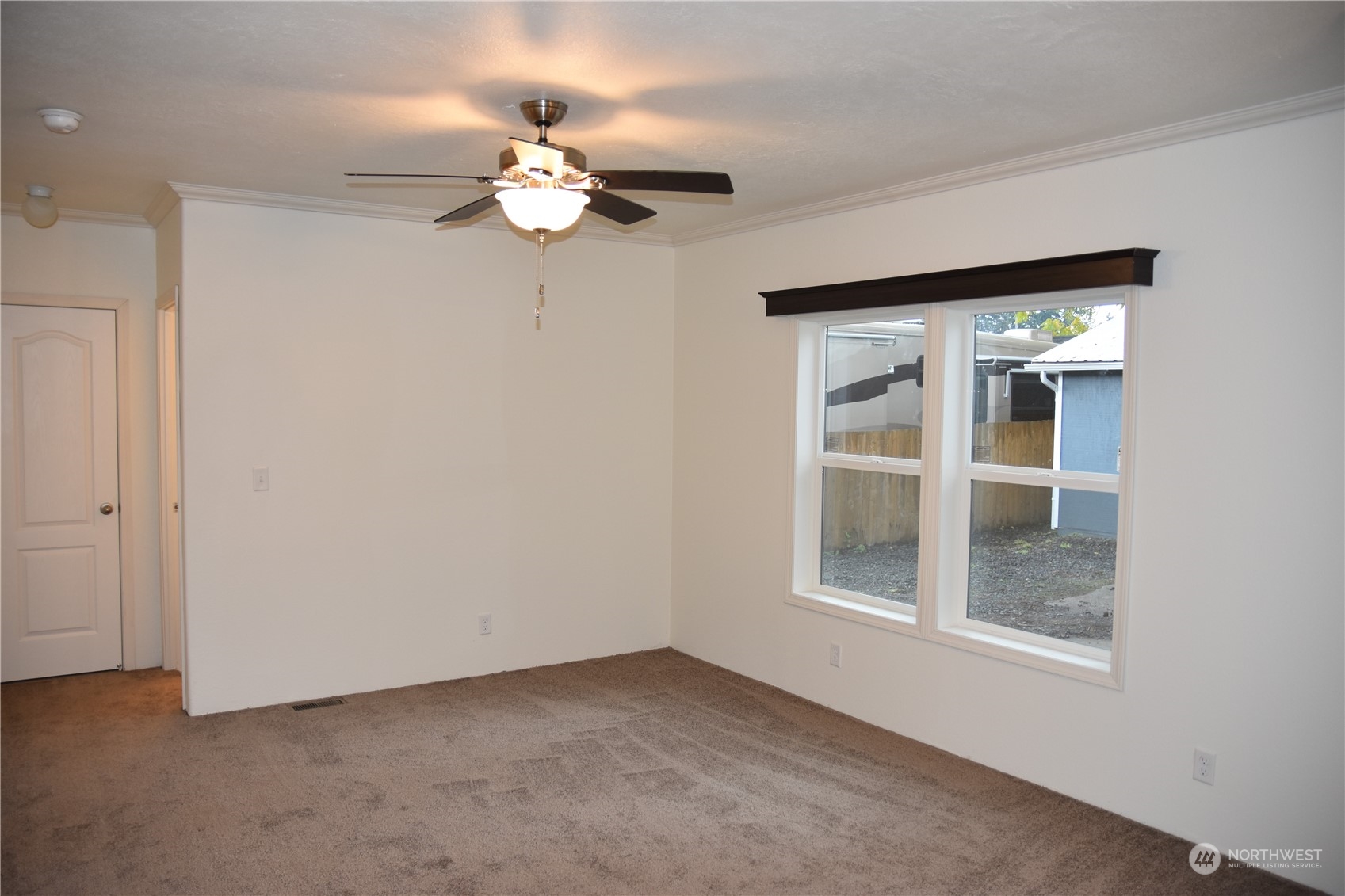 4322 Ocean Beach Highway Longview, WA 98632 - Photo 7 of 19 a view of an empty room with a window