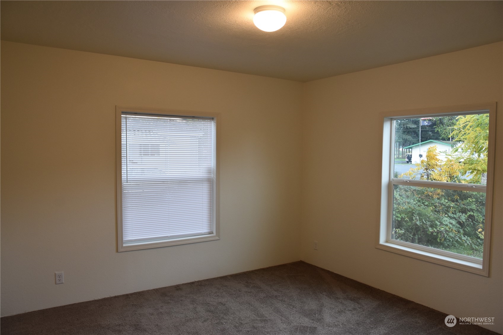 4322 Ocean Beach Highway Longview, WA 98632 - Photo 9 of 19 an empty room with windows