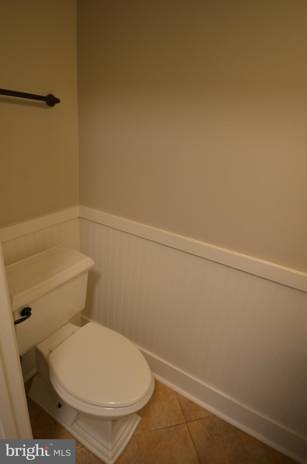 7559 Westmore Drive Springfield, VA 22150 - Photo 16 of 42 Beadboard trim in Powder Room