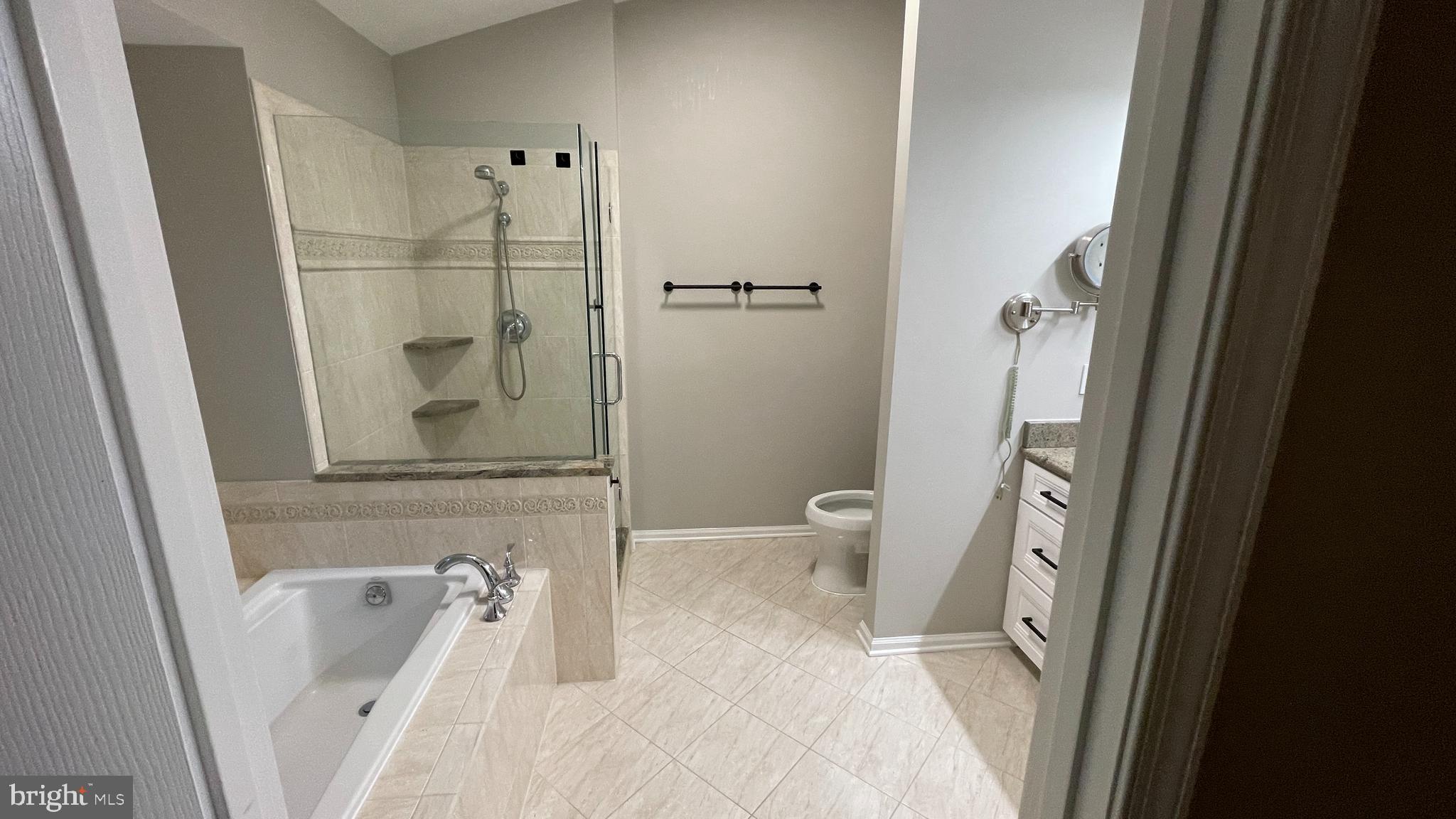 7559 Westmore Drive Springfield, VA 22150 - Photo 21 of 42 Stunning Primary Bath with soaking tub & shower