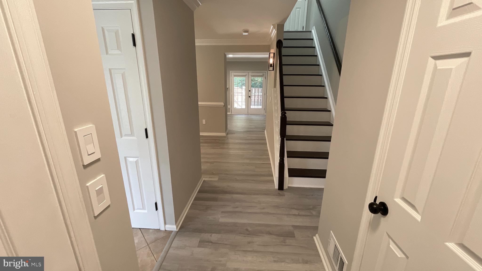 7559 Westmore Drive Springfield, VA 22150 - Photo 3 of 42 View from entryway to French doors and patio