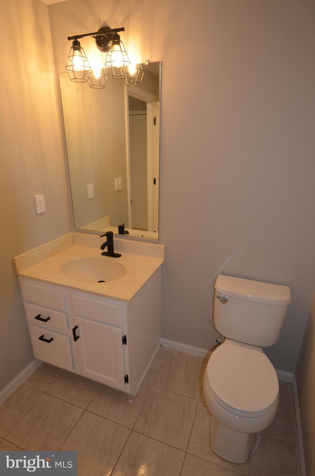 7559 Westmore Drive Springfield, VA 22150 - Photo 39 of 42 Lower-Level Bath just off Garage entrance