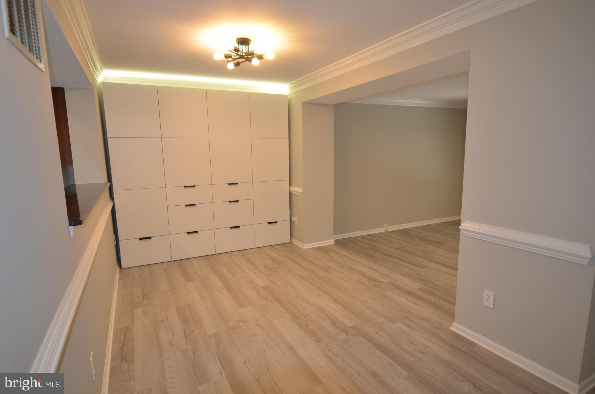 7559 Westmore Drive Springfield, VA 22150 - Photo 10 of 42 Dining Room storage compliments kitchen shelving