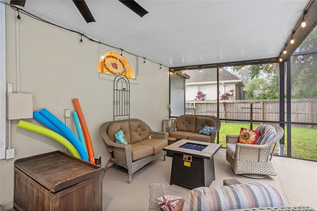 14612 Bray Road Orlando, FL 32832 - Photo 9 of 33 a living room with furniture and a floor to ceiling window