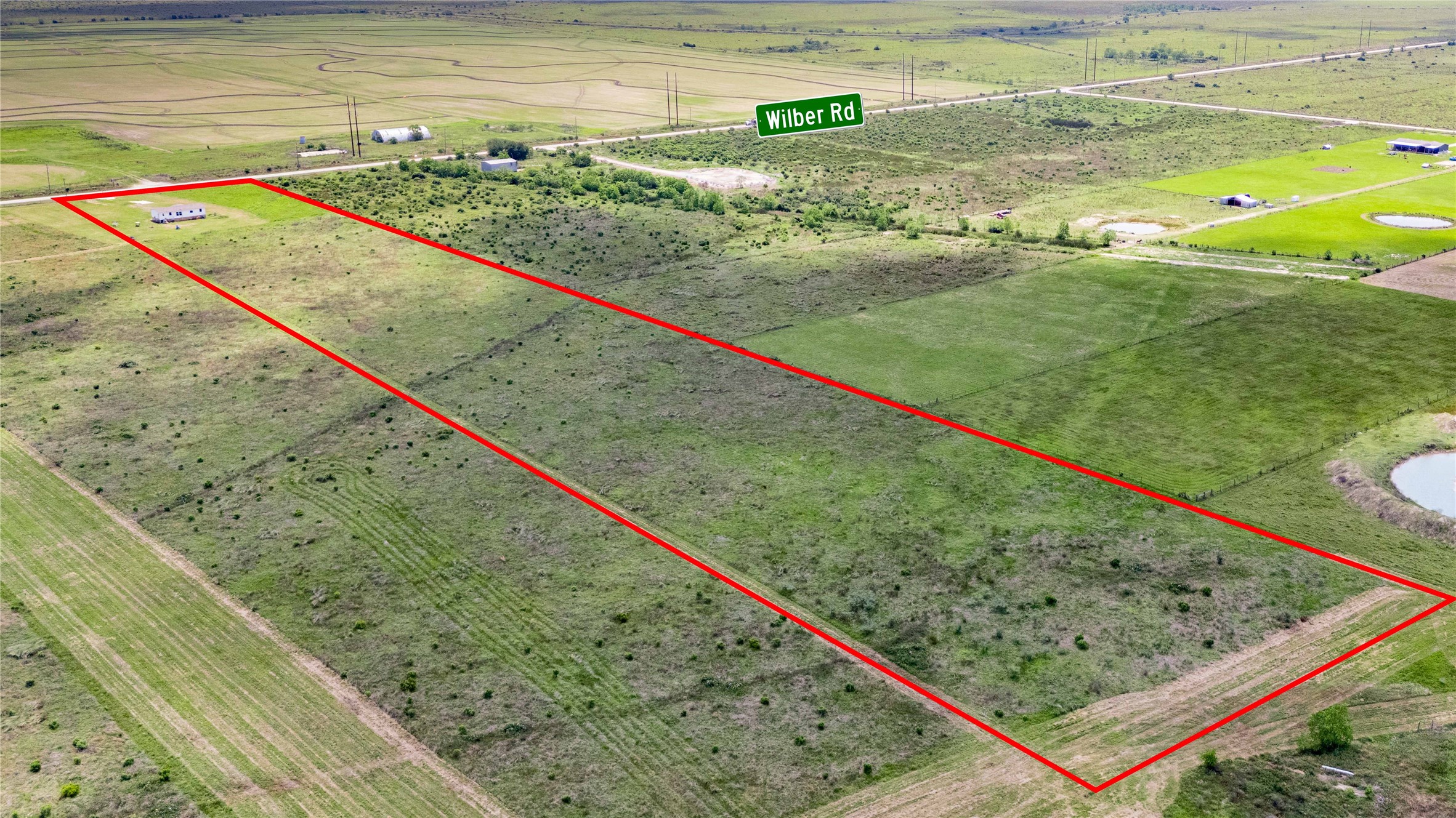 21550 Wilber Road Winnie, TX 77665 - Photo 4 of 28 a view of a field with an ocean