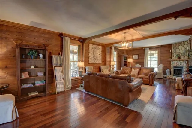 a bedroom with a bed and a fireplace