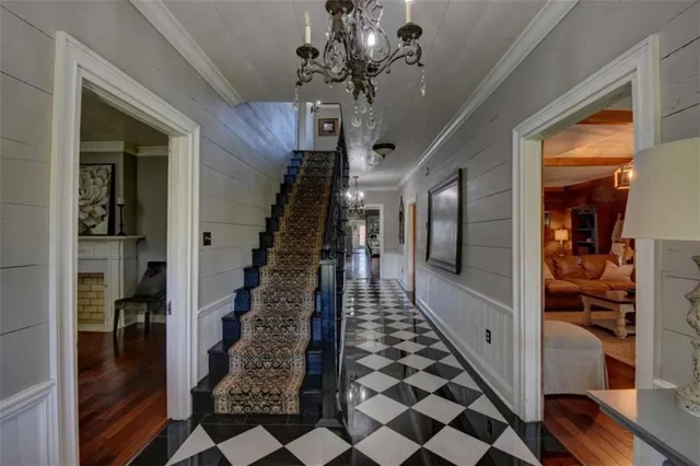 a bedroom with a bed and a fireplace