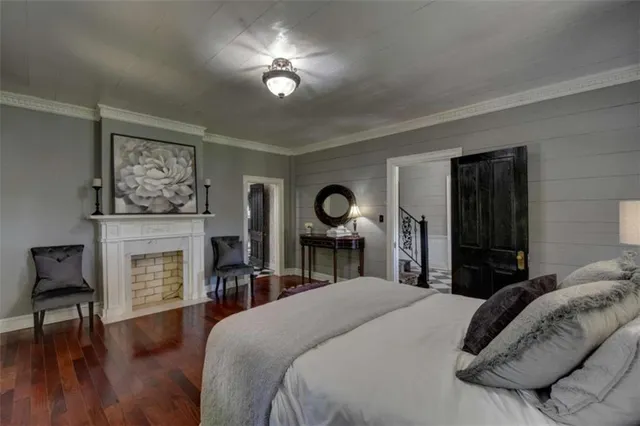 a dining room with furniture window wooden floor and a rug