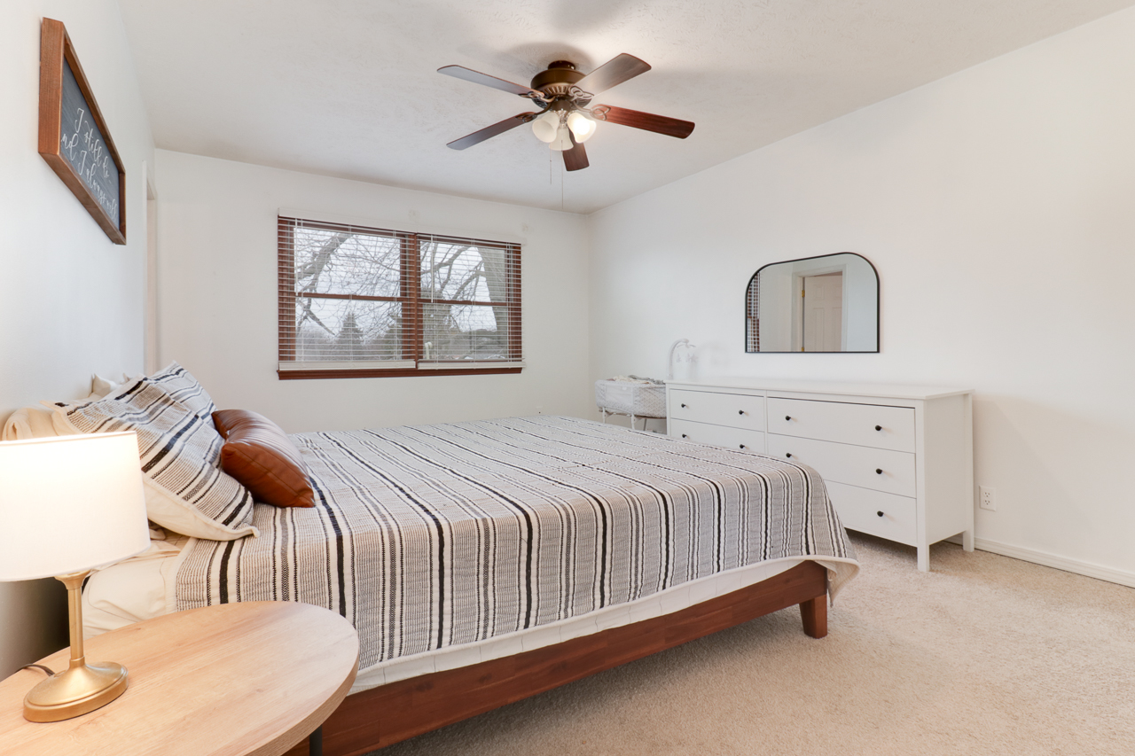 307 Garden Road Normal, IL 61761 - Photo 14 of 32 a bedroom with bed and window
