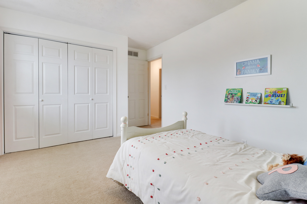 307 Garden Road Normal, IL 61761 - Photo 23 of 32 a bedroom with a bed and hallway