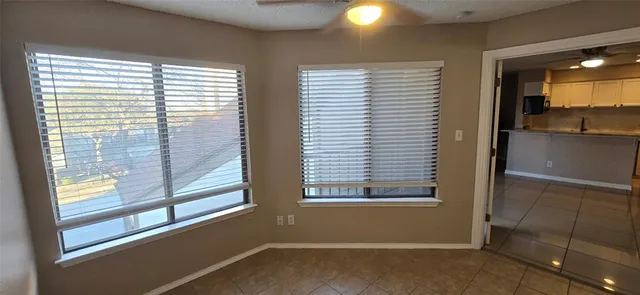 a view of a room that has a window in it