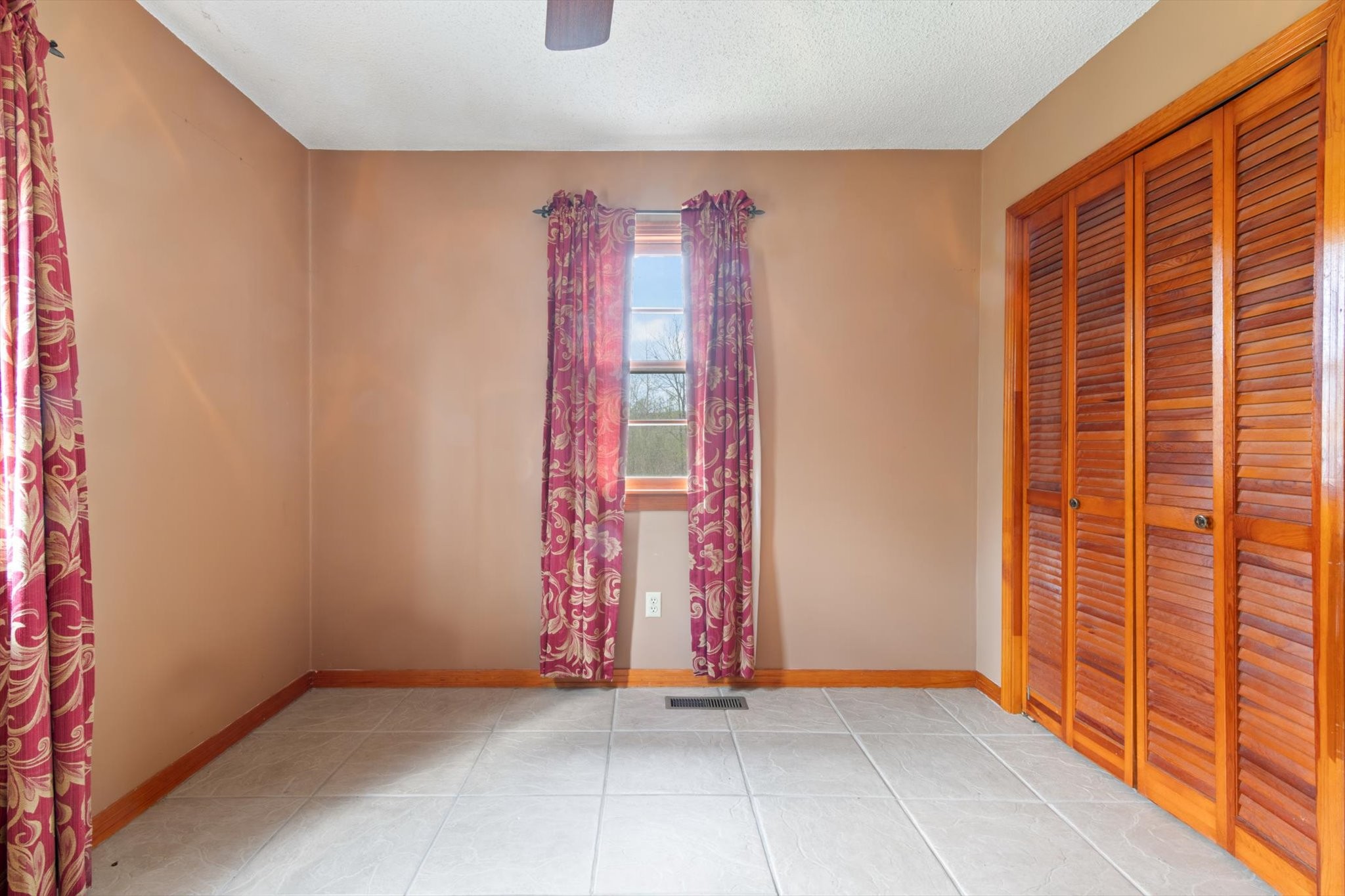 5429 Baxter Road Baxter, TN 38544 - Photo 23 of 36 a view of a room with wooden walls and stairs