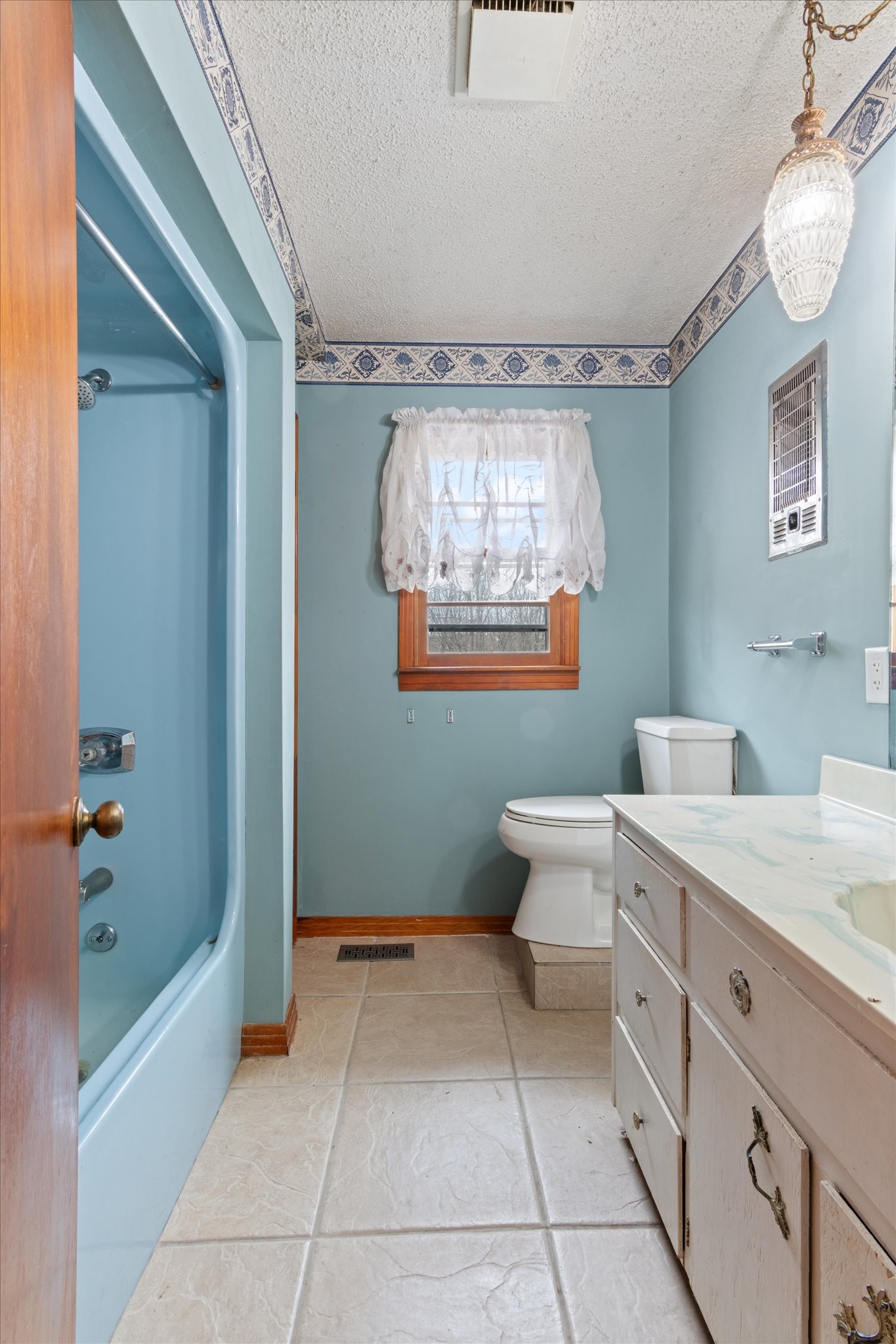 5429 Baxter Road Baxter, TN 38544 - Photo 24 of 36 a spacious bathroom with a granite countertop sink a toilet and shower