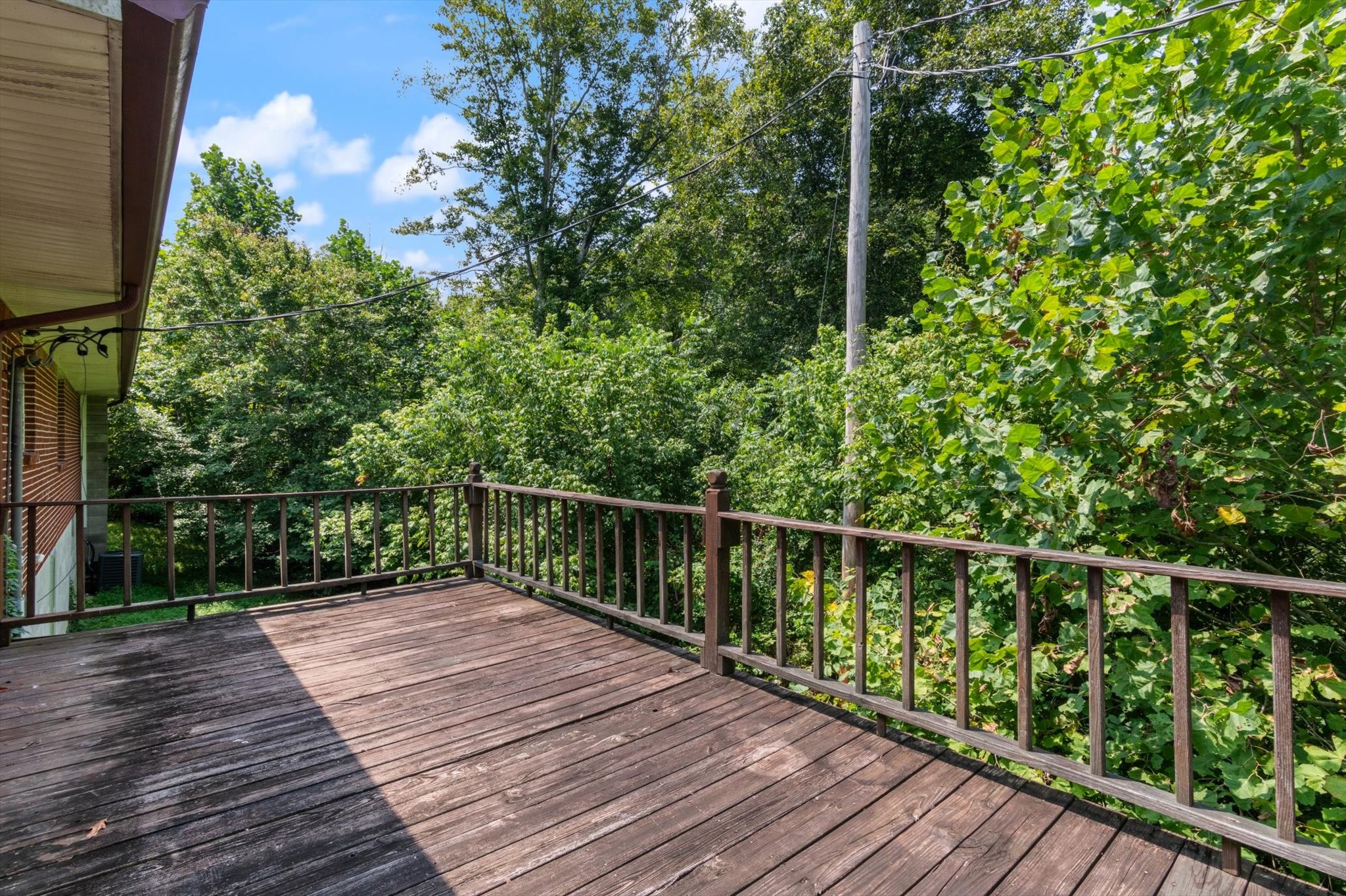 5429 Baxter Road Baxter, TN 38544 - Photo 33 of 36 a balcony with wooden floor
