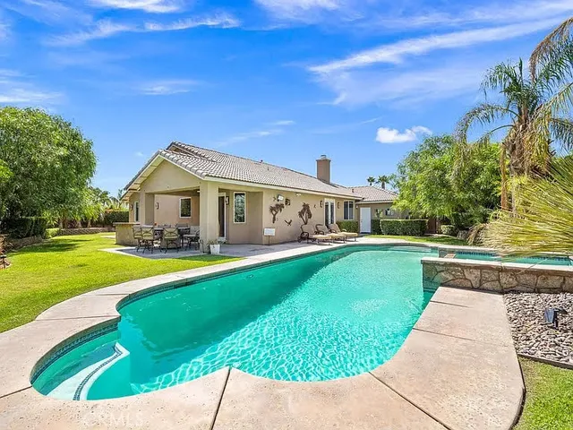 a view of a house with a swimming pool