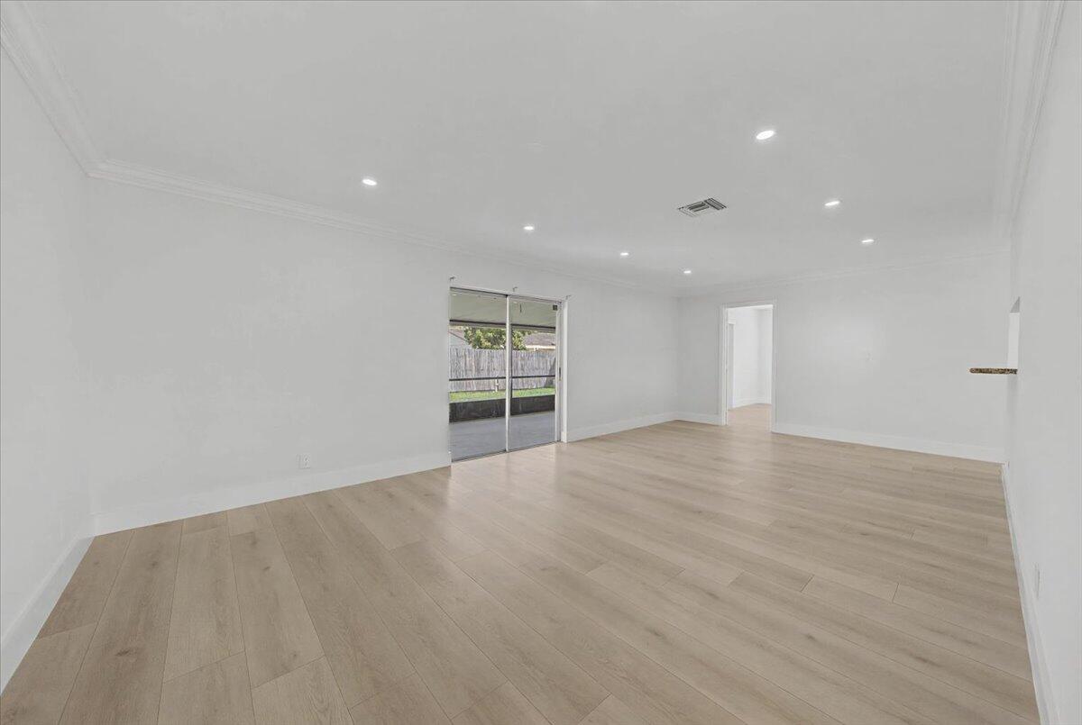 7781 Northwest 46th Street Lauderhill, FL 33351 - Photo 13 of 42 a view of an empty room with a window