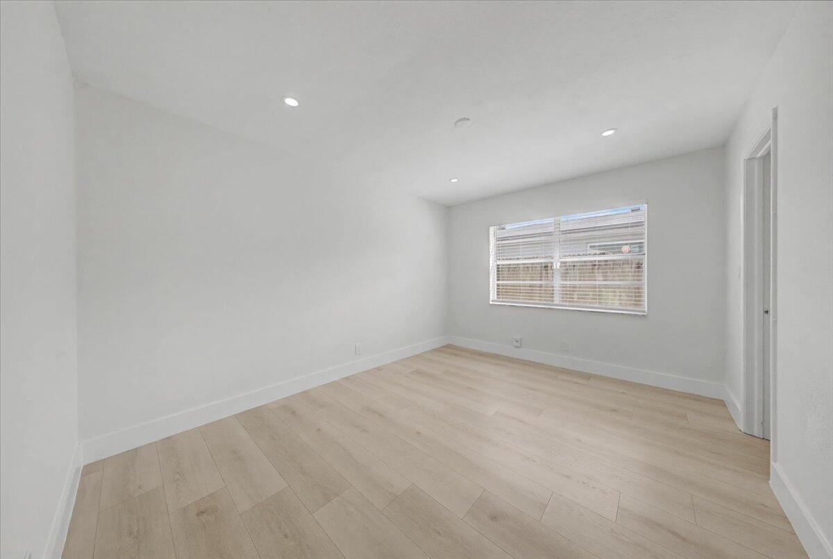 7781 Northwest 46th Street Lauderhill, FL 33351 - Photo 20 of 42 an empty room with a empty space and window
