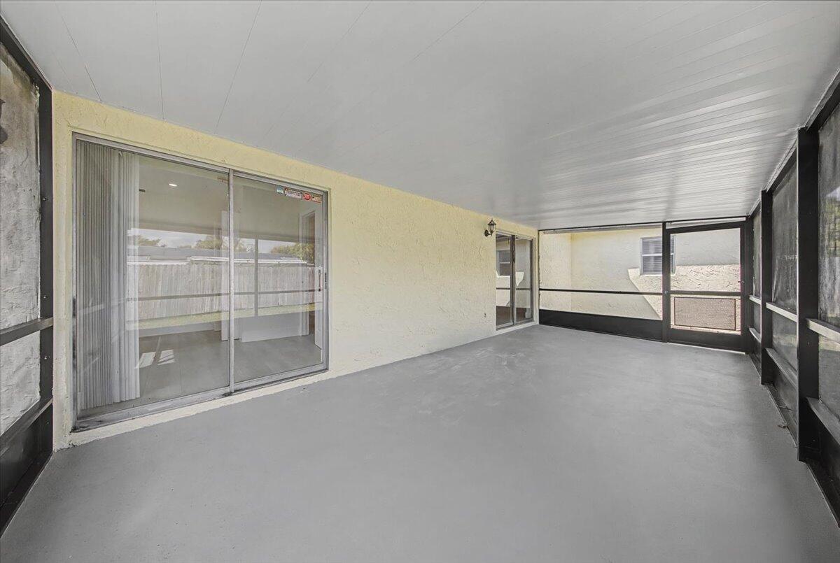 7781 Northwest 46th Street Lauderhill, FL 33351 - Photo 36 of 42 a view of a room with racks on the wall