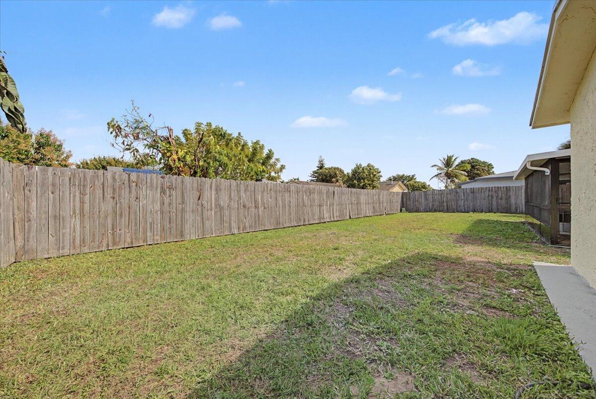 7781 Northwest 46th Street Lauderhill, FL 33351 - Photo 38 of 42 a view of backyard with green space