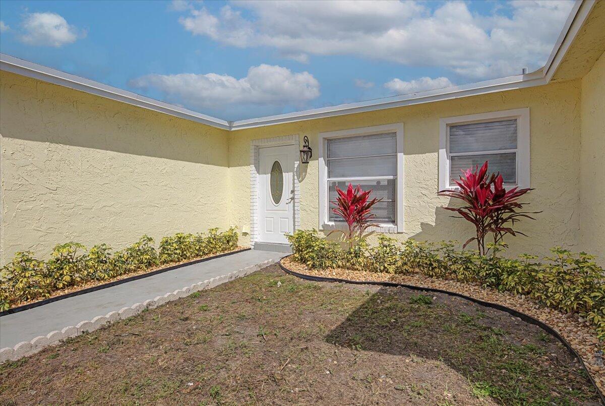7781 Northwest 46th Street Lauderhill, FL 33351 - Photo 4 of 42 a view of a entryway