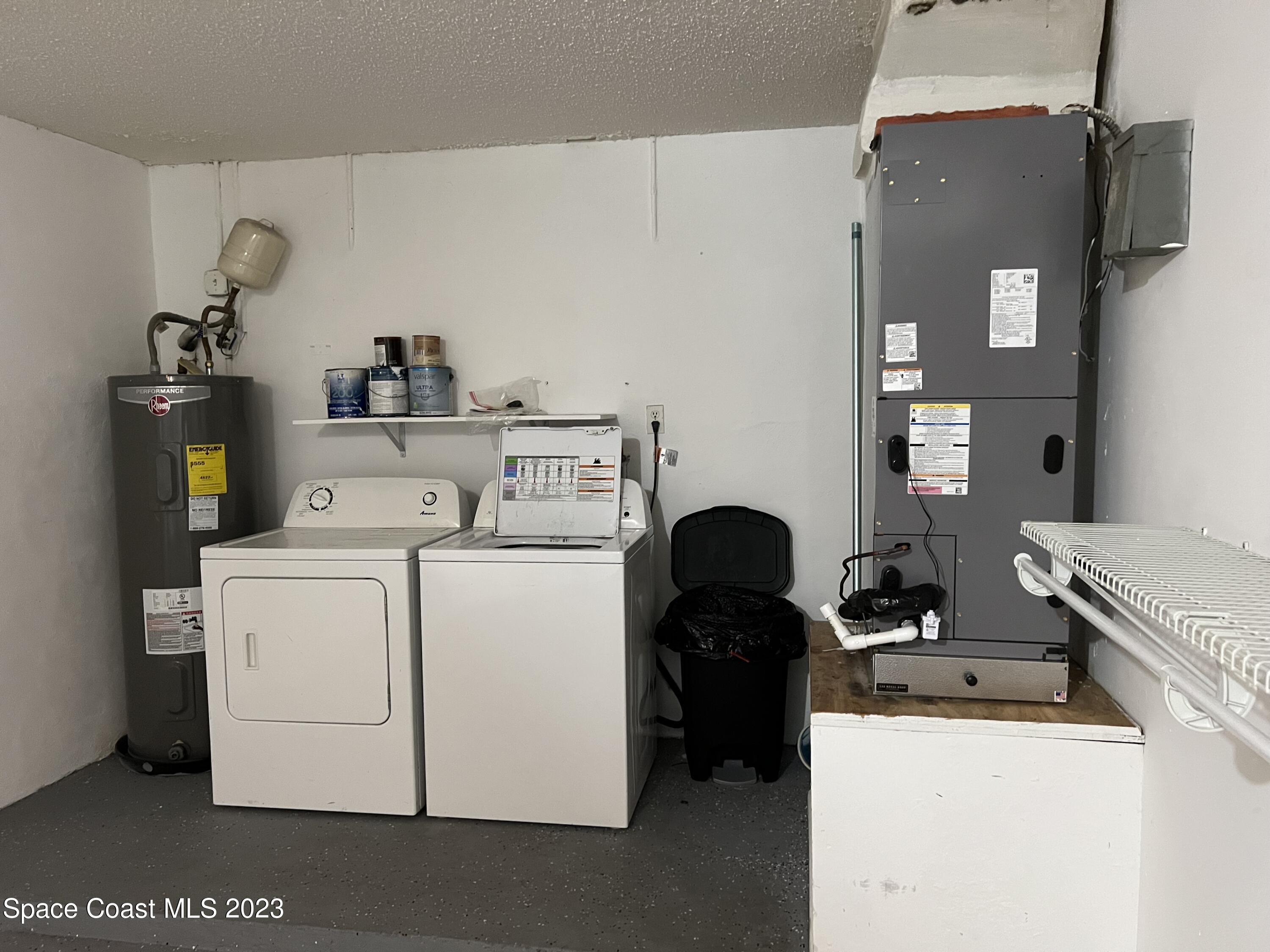 283 Fecco Street Cocoa, FL 32927 - Photo 16 of 25 a utility room with dryer and washer