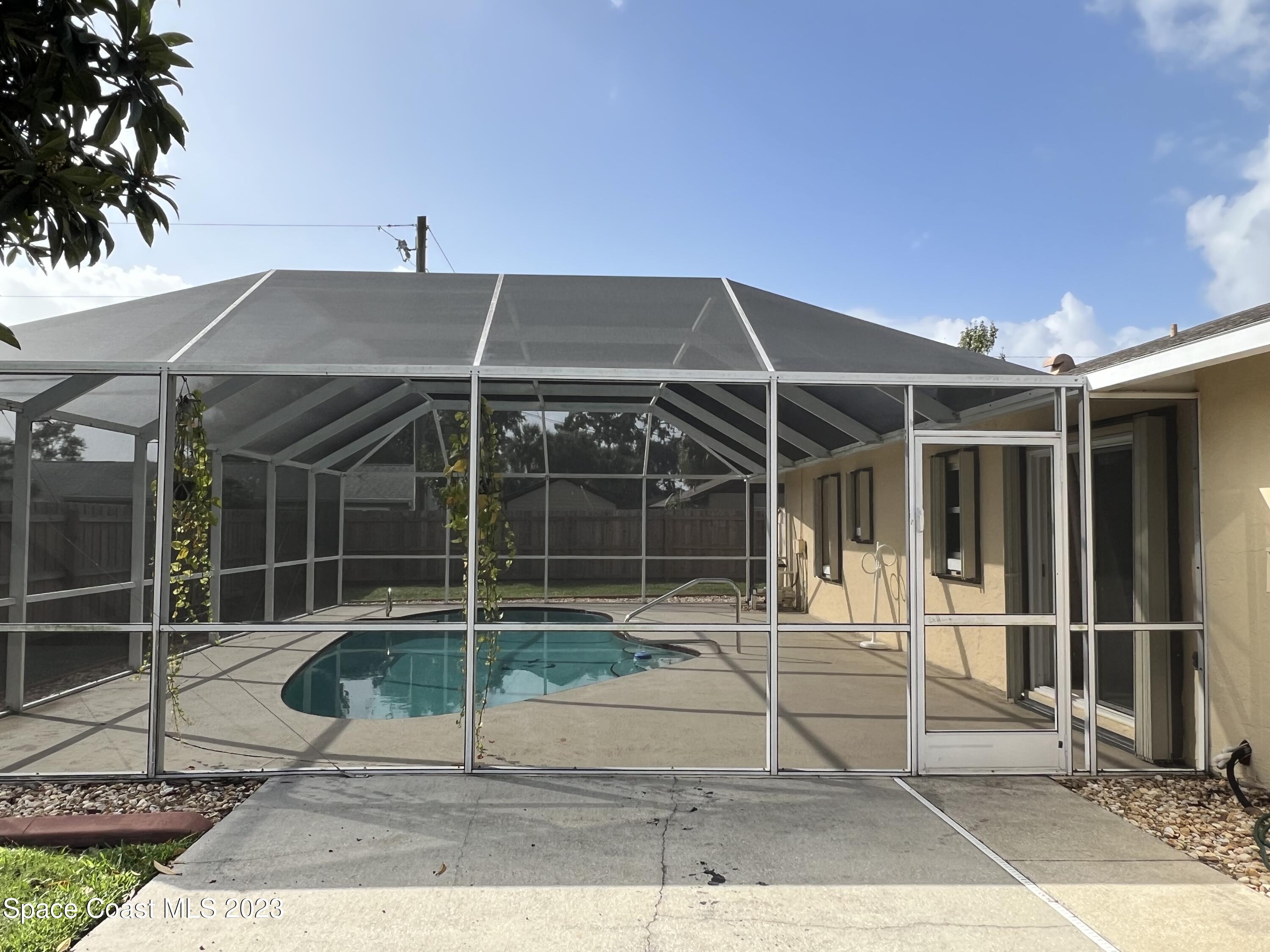 283 Fecco Street Cocoa, FL 32927 - Photo 23 of 25 a view of a house with backyard