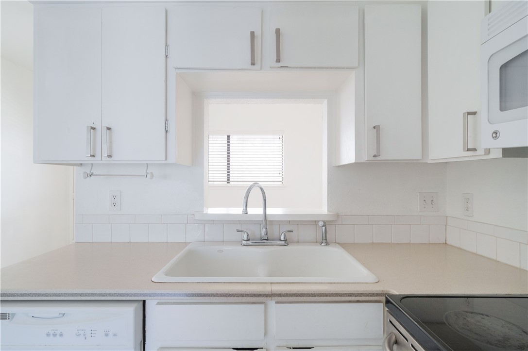 2605 Enfield Road, Unit 110 Austin, TX 78703 - Photo 22 of 22 Counter-Diswaher and
Cabinets