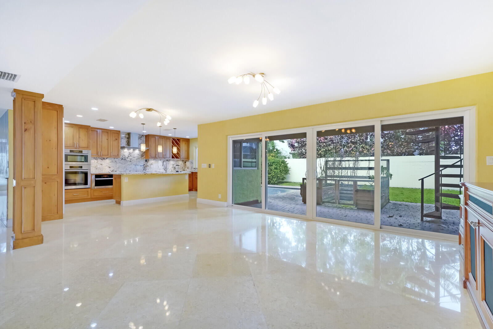 4177 Northwest 28th Way Boca Raton, FL 33434 - Photo 14 of 44 View to kitchen from Family Room