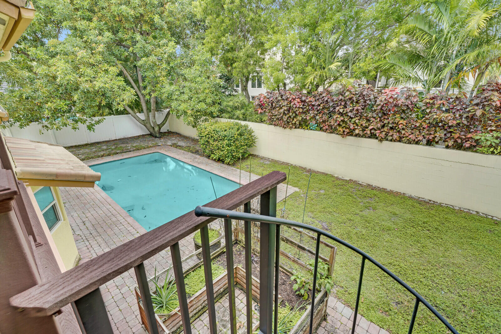4177 Northwest 28th Way Boca Raton, FL 33434 - Photo 30 of 44 View of pool from Master Bedroom Balcony