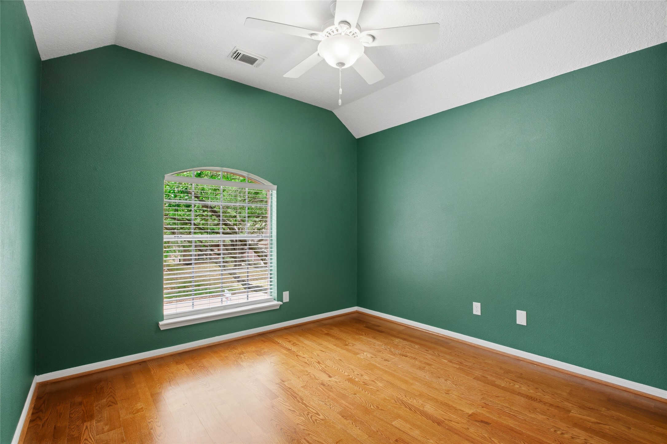 20907 Nettlebrook Lane Katy, TX 77450 - Photo 29 of 46 Each secondary bedroom brings its own personality with vaulted ceilings that add a sense of space and dimension.